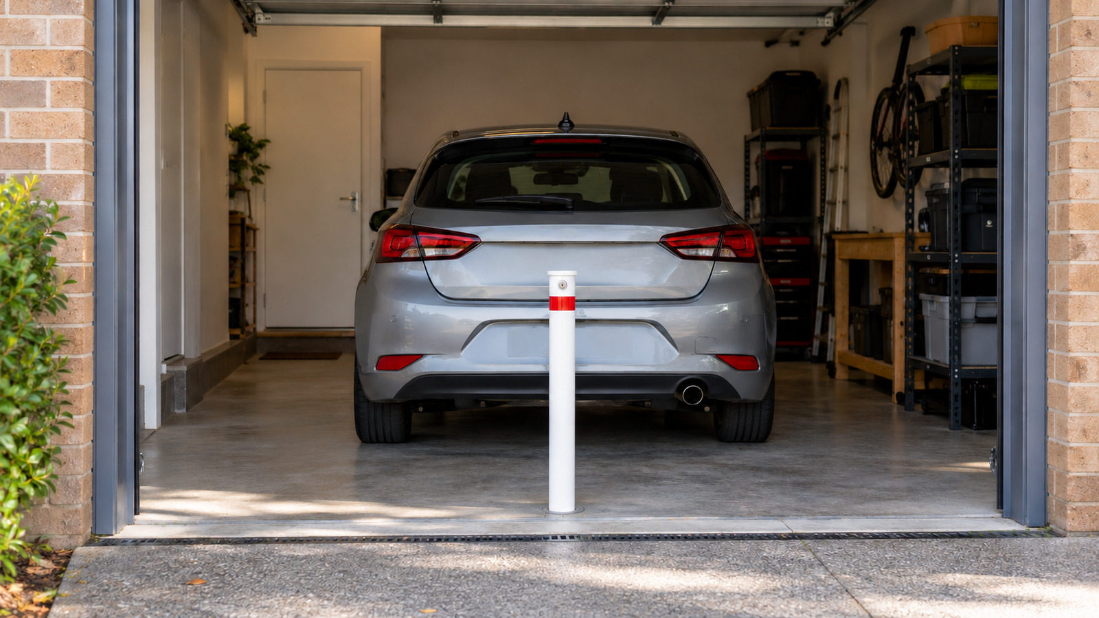Where should a bollard go in a single-car garage?